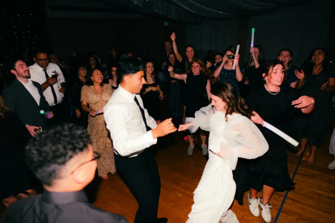 Image of a wedding party at night